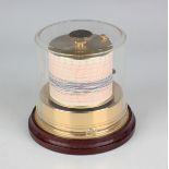 A late 20th century Sewills gilt brass cylindrical barograph with mahogany base and Perspex cover,