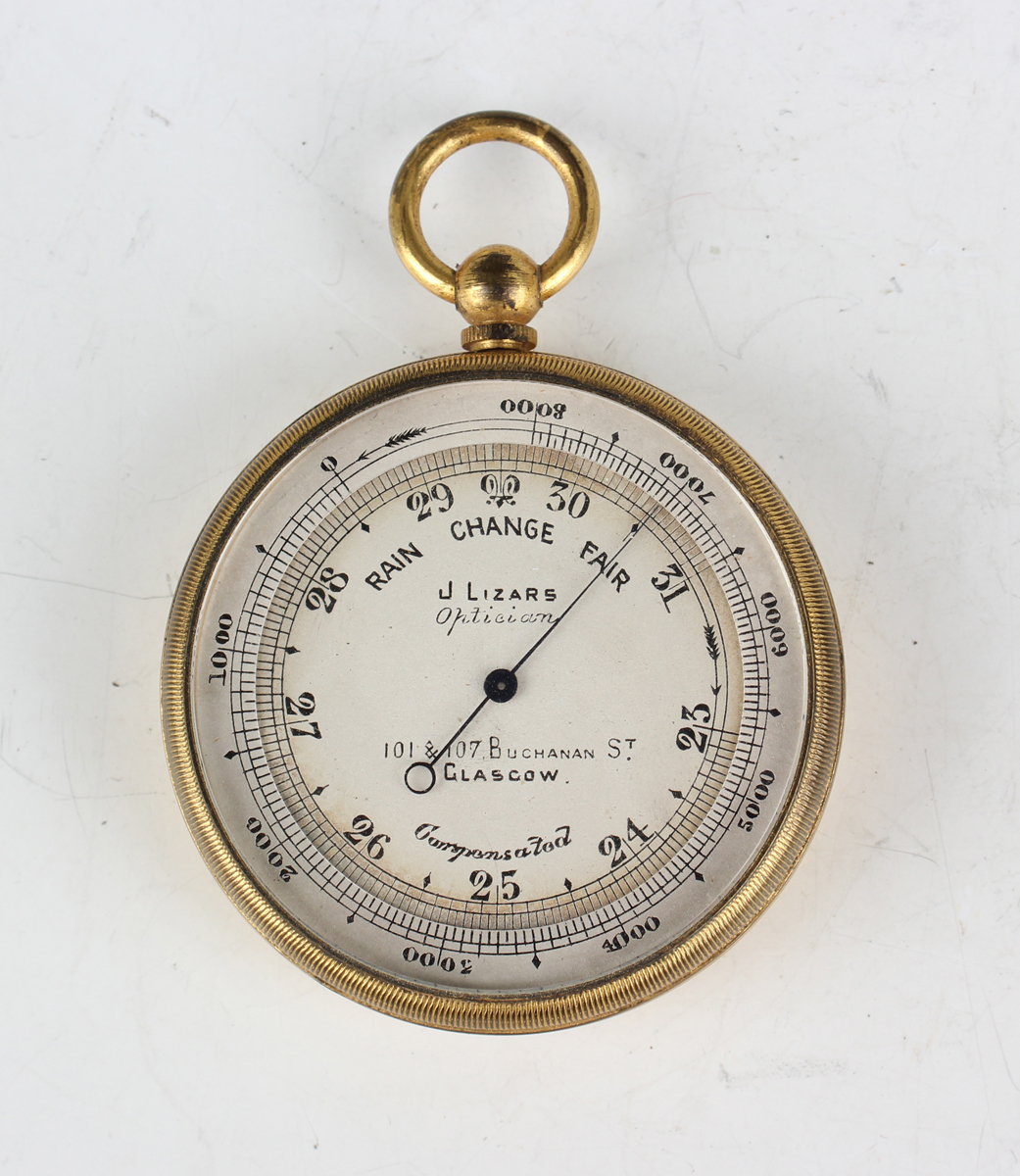 An early 20th century gilt brass circular pocket barometer altimeter, the silvered dial with outer