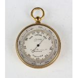 An early 20th century gilt brass circular pocket barometer altimeter, the silvered dial with outer