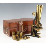 A Victorian lacquered and black enamelled brass binocular microscope, signed 'H. Crouch 51 London