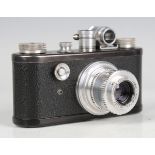 A Corfield Periflex camera, serial number '2235', with Lumar F=50mm 1:3.5 lens, leather cased.