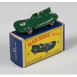 A Matchbox Series No. 41 Jaguar racing car in green with race number 41 and wire wheels with black