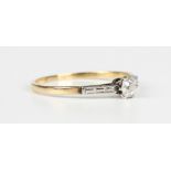 A gold and diamond single stone ring, claw set with a cushion cut diamond, unmarked, weight 1.5g,