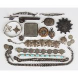 A small group of mostly silver jewellery, including a graduated curblink watch Albert chain,