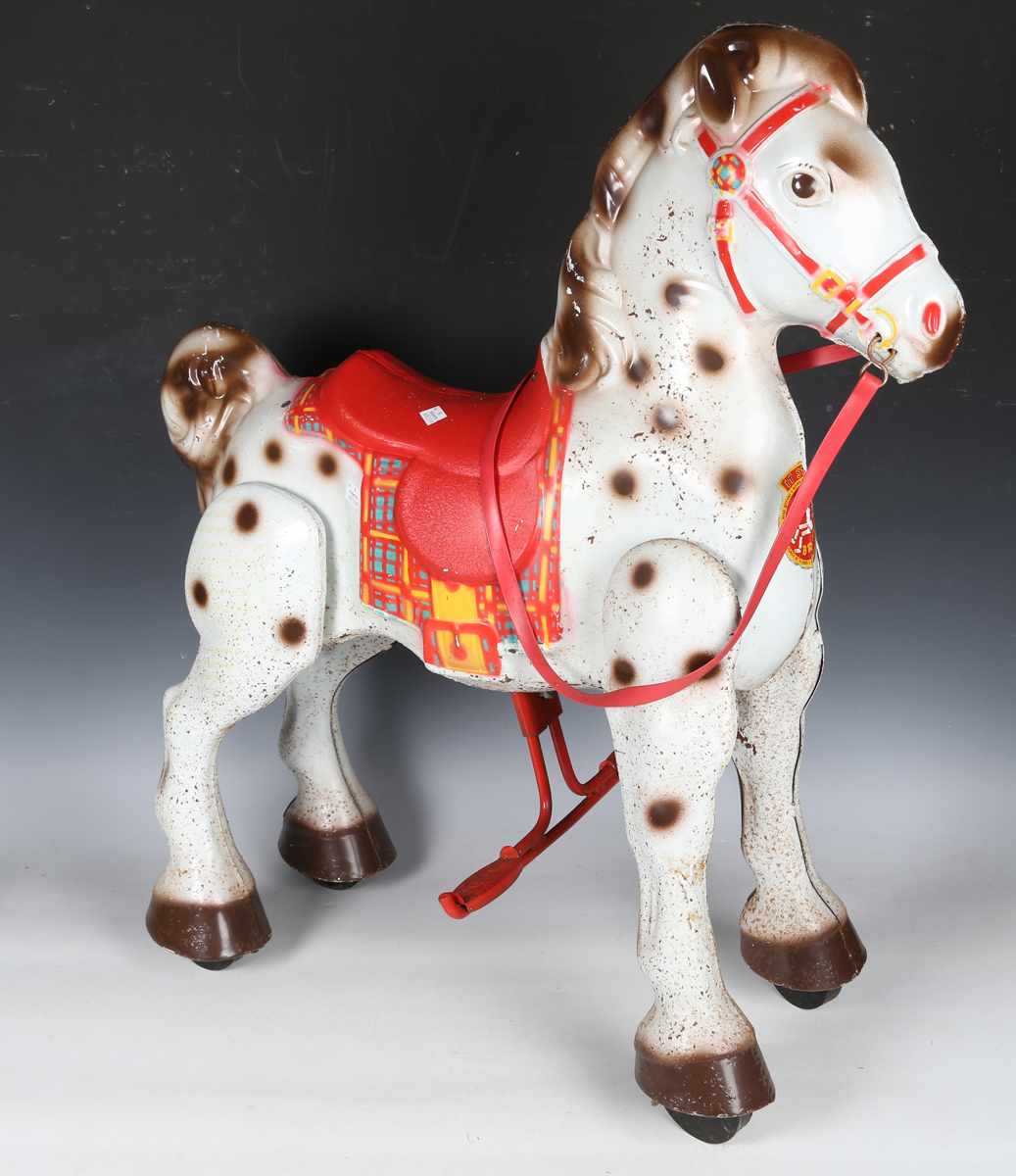 A Mobo Bronco ride-on walking horse, length 66cm (some playwear and surface rust).Buyer’s Premium