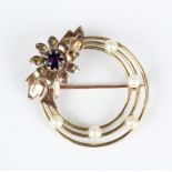 A two gold, amethyst and cultured pearl brooch, circa 1950, designed as three concentric circles