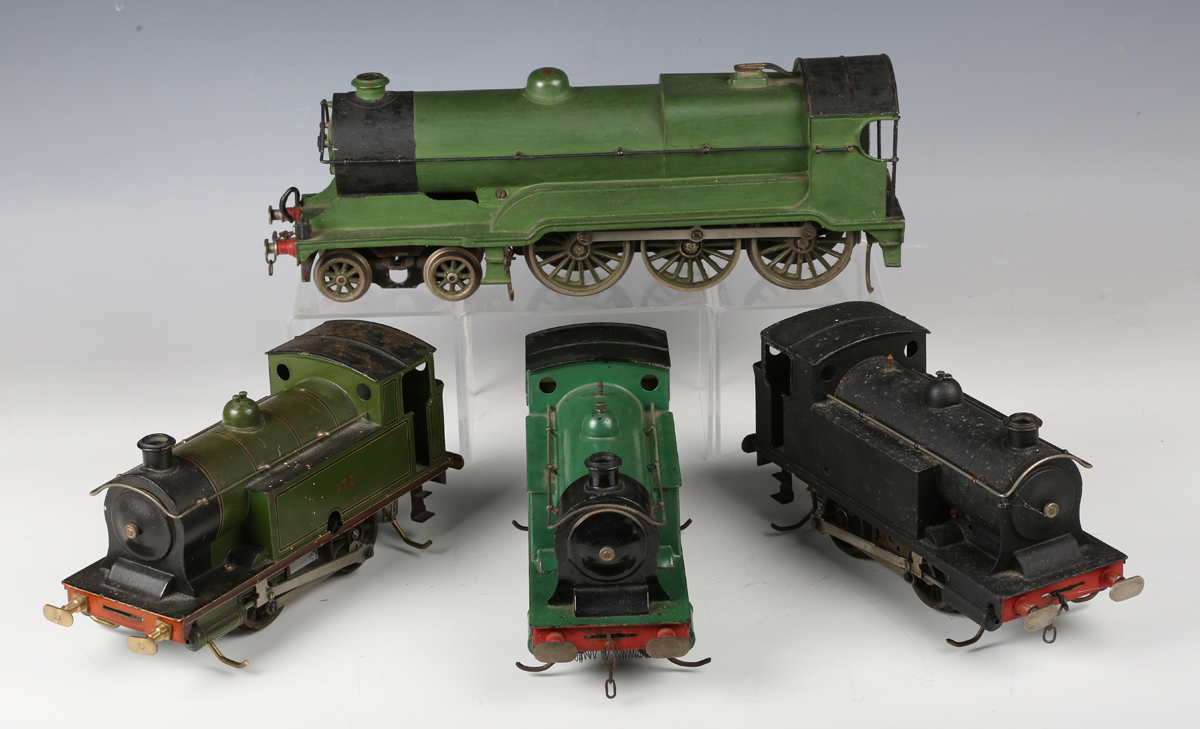 A collection of gauge 1 trains and accessories, comprising electric 4-6-0 locomotive and tender in