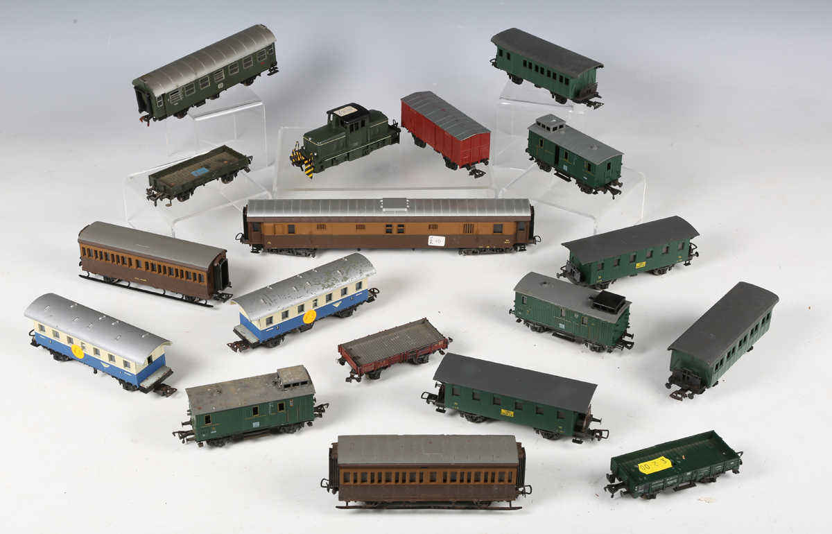 A collection of Liliput, RoCo, Rivarossi and Replica Railways coaches and goods rolling stock,