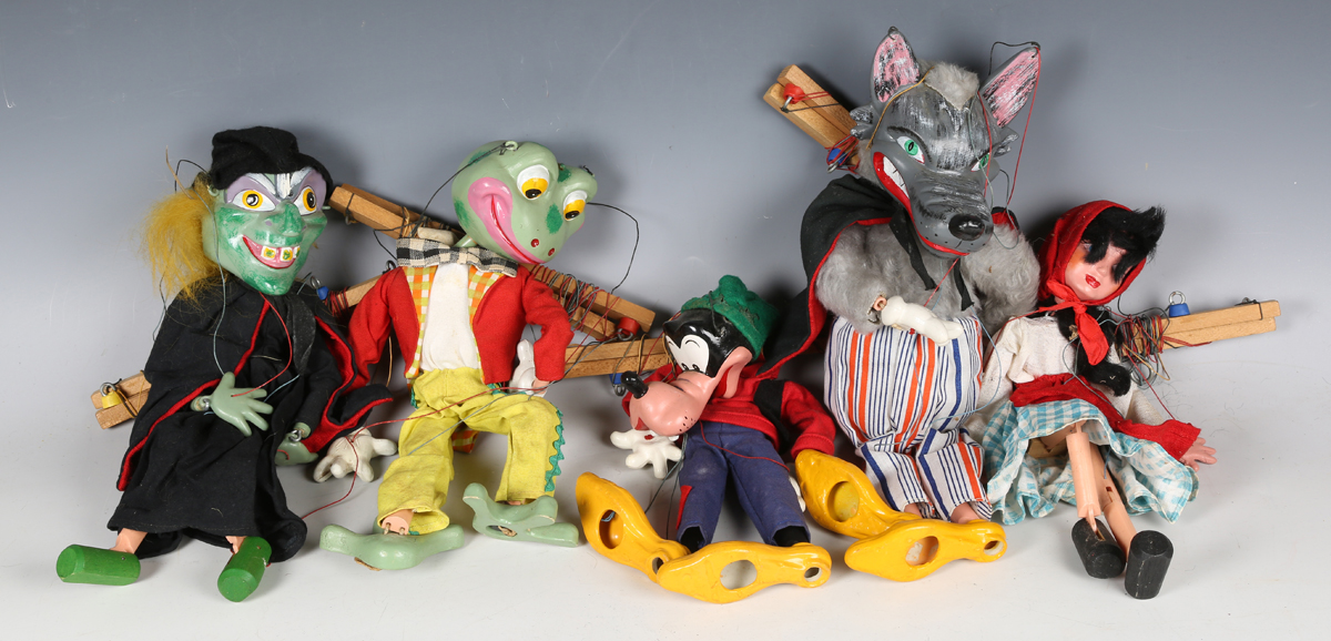 Ten Pelham Puppets, including Wolf, Witch and Dragon (some playwear).Buyer’s Premium 29.4% (