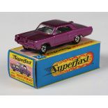 A Matchbox Superfast No. 22 Pontiac GP sports coupé in metallic purple with light grey interior