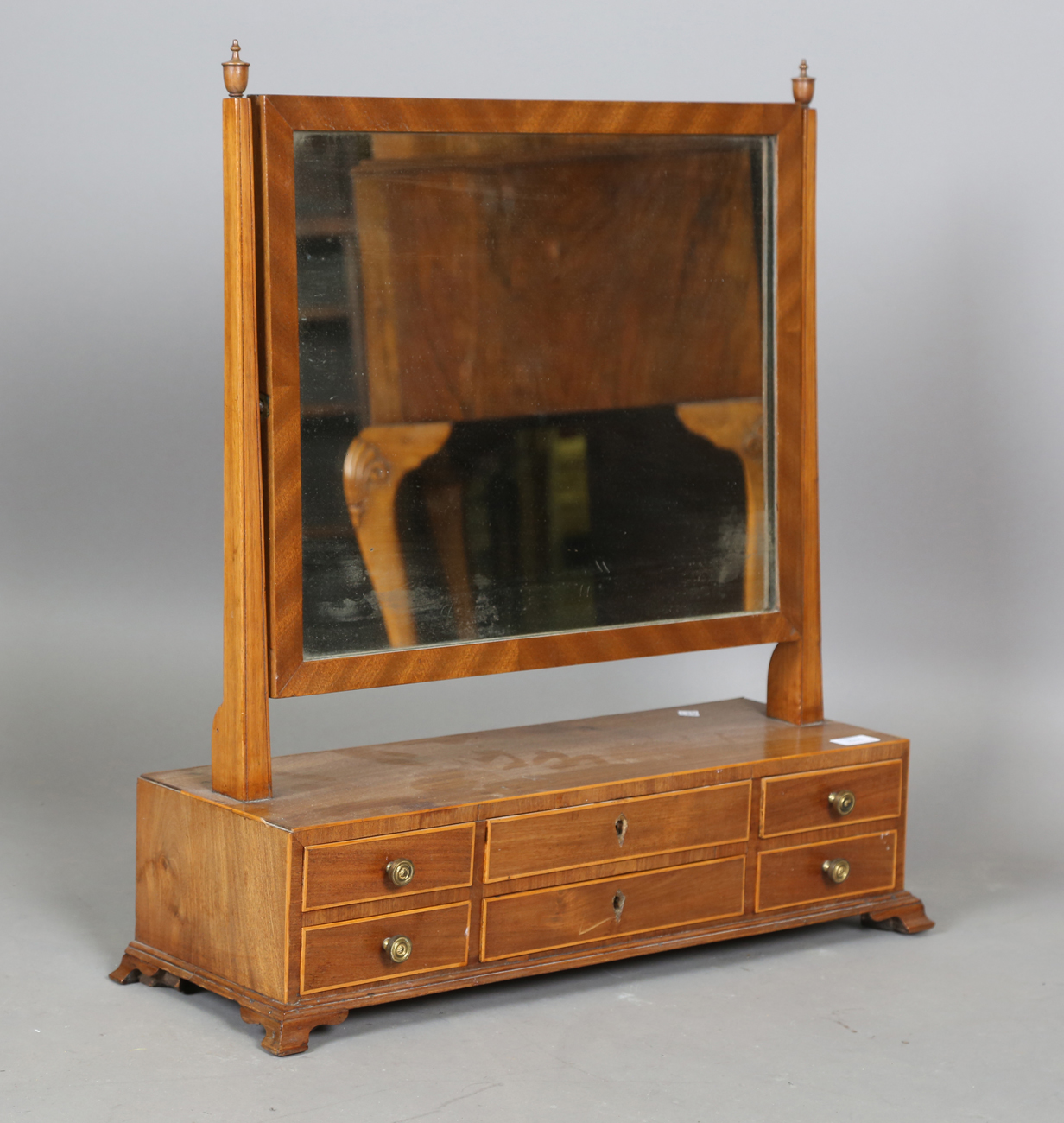 A 19th century mahogany swing frame mirror, fitted with six drawers with boxwood stringing, height