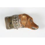 An unusual early 20th century plated brass and fur covered novelty vesta case in the form of a dog's
