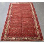 A Serrabend or Mir rug, North-west Persia, late 20th century, the red field with overall boteh,