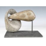 A mid-20th century abstract two-piece carved and polished granite sculpture, in the manner of