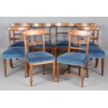 A harlequin set of eight Regency mahogany and rosewood bar back dining chairs, comprising a set of