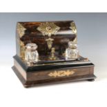 A Victorian Gothic Revival coromandel and brass mounted desk stand, inset with three banded agate