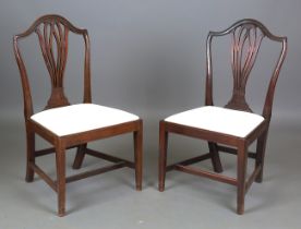 A set of ten George III pierced splat back dining chairs with drop-in seats, height 97cm, width 53cm