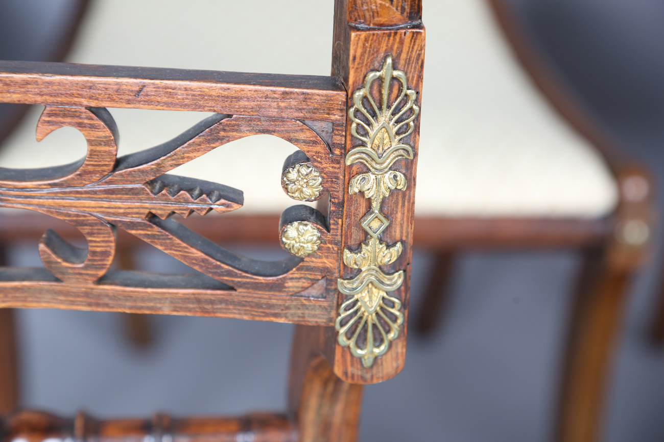 A set of eight Regency simulated rosewood and gilt brass mounted dining chairs, the centre rails - Bild 9 aus 25