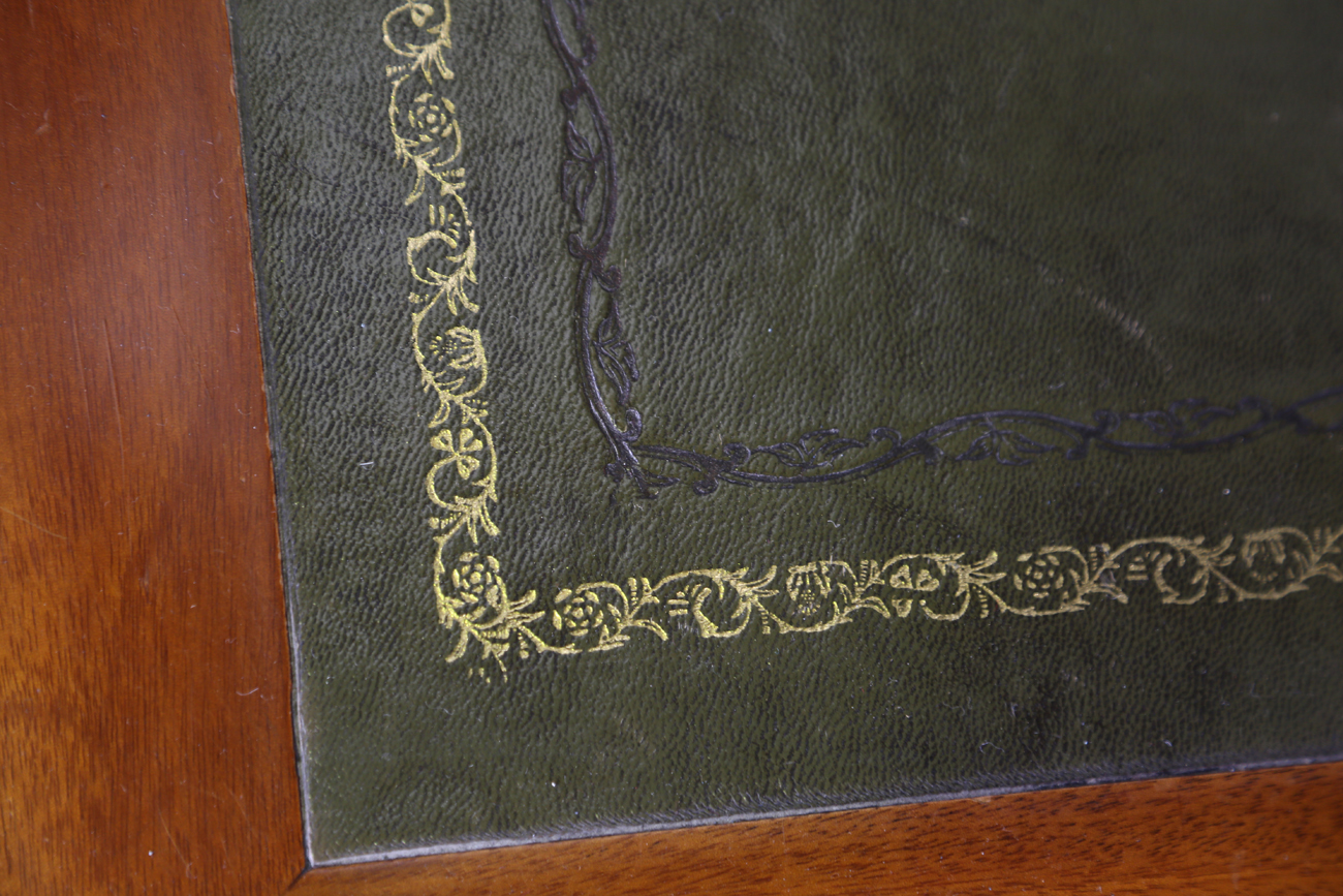 A 20th century Victorian style mahogany writing table, the top inset with gilt-tooled green - Image 8 of 9