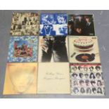 A collection of fifteen LP records by The Rolling Stones, including 'No. 2', 'Beggars Banquet'