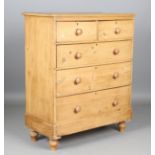 A Victorian pine chest of drawers, height 122cm, width 102cm, depth 51cm.Buyer’s Premium 29.4% (