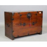 A 19th century Korean softwood and iron mounted chest, height 53cm, width 77cm, depth 36cm.Buyer’s
