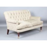 A modern Moinat two-seat settee, upholstered in buttoned taupe fabric, height 87cm, width 140cm,