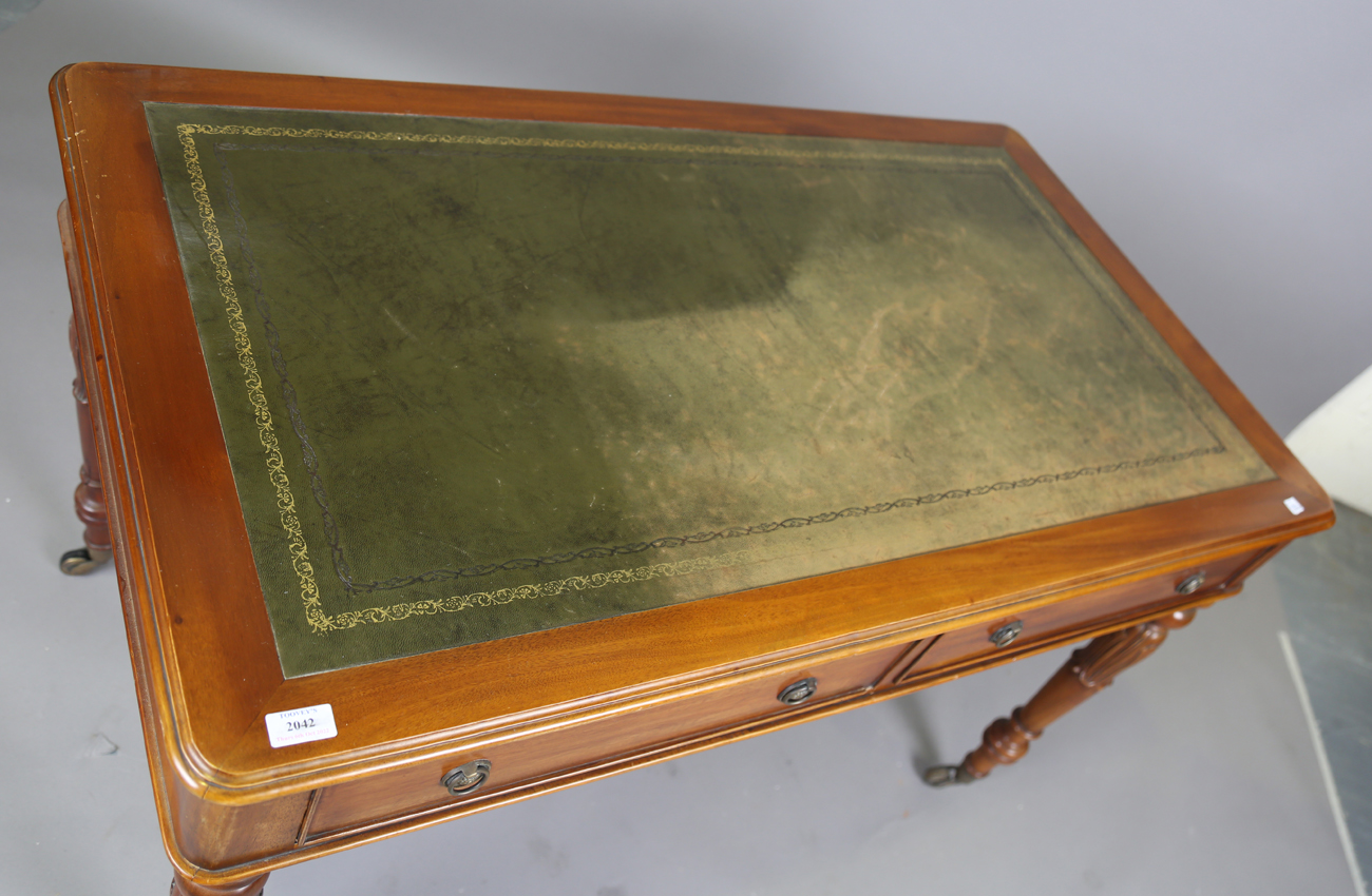 A 20th century Victorian style mahogany writing table, the top inset with gilt-tooled green - Image 9 of 9