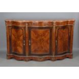 A 20th century kingwood credenza with shaped marble top and floral marquetry, applied with overall