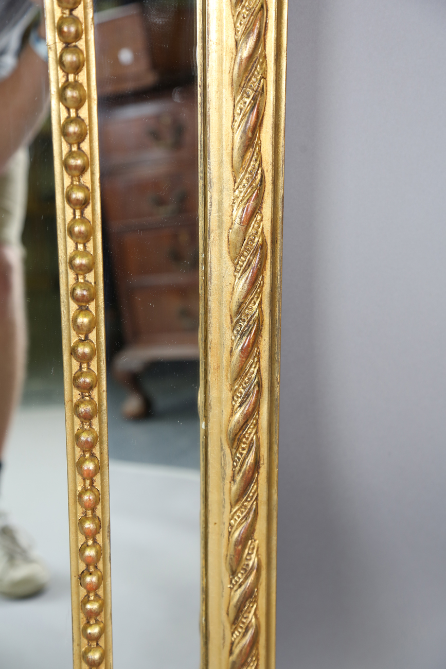 A 19th century gilt composition sectional wall mirror with a bird and quiver surmount above a beaded - Bild 3 aus 9