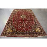 A Bidjar carpet, North-west Persia, 20th century, the red field with a shaped medallion supported by