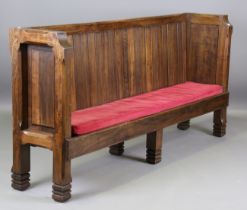 A large mid-20th century elm panelled back settle with chamfered corners, height 112cm, width 240cm,
