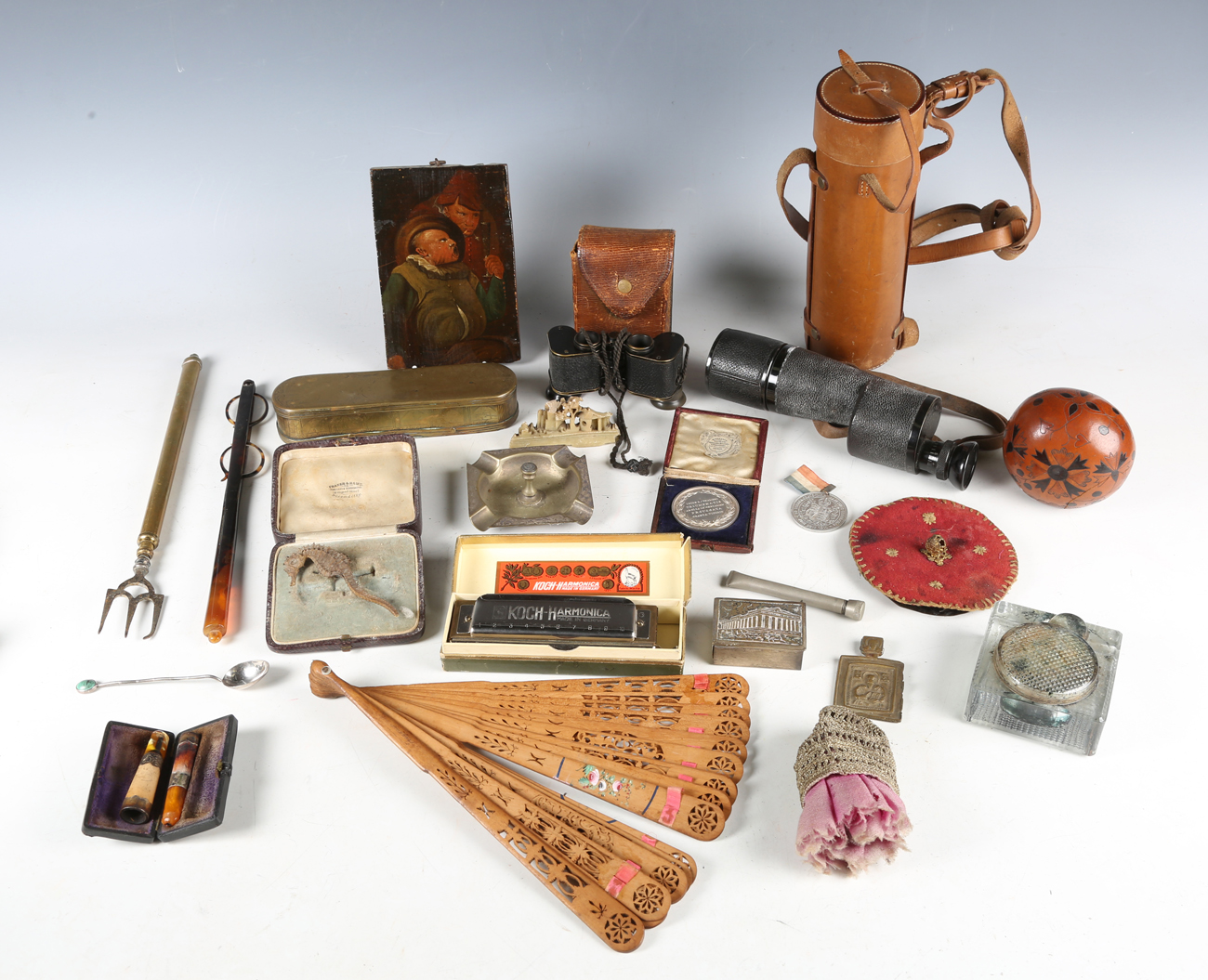 A mixed group of collectors' items, including an 18th century Dutch brass tobacco box with
