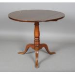 A 19th century mahogany tip-top circular supper table, raised on a tripod base, height 72cm,