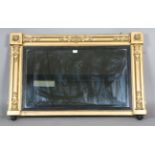 A Regency giltwood and composition overmantel mirror with applied foliate mouldings, 75cm x 115cm (