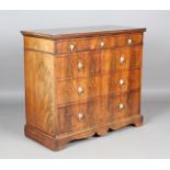 A 19th century French figured mahogany chest of drawers, the mahogany-lined drawers with applied