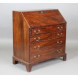 A George III mahogany bureau, fitted with four oak-lined drawers, height 105cm, width 95cm, depth