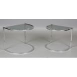 A pair of mid-20th century chromium plated and smoky glass occasional tables, height 40cm, width