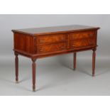 A late 20th century reproduction mahogany side table, fitted with four drawers, height 76cm, width