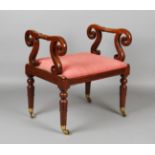 A William IV mahogany window seat with scrollwork arms and a padded drop-in seat, on tulip cusp legs
