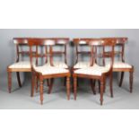 A set of six Regency mahogany bar back dining chairs with finely carved tulip cusp centre rails
