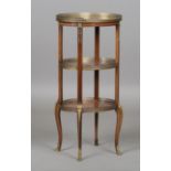 A fine early 20th century French kingwood and mahogany three-tier étagère with applied ormolu mounts
