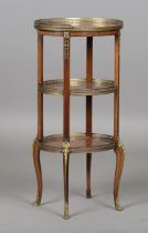 A fine early 20th century French kingwood and mahogany three-tier étagère with applied ormolu mounts