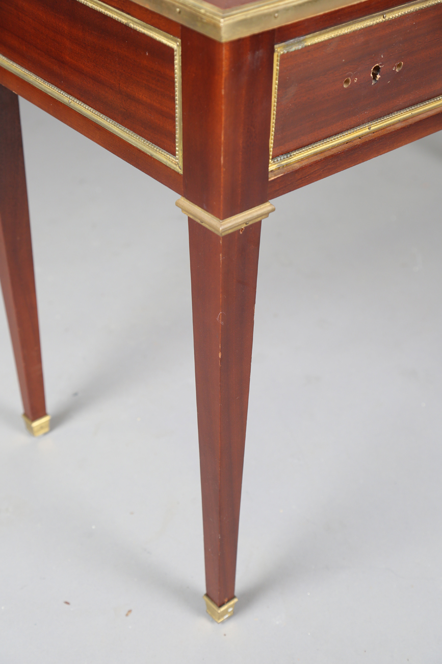 A 20th century French mahogany and gilt metal mounted writing table, fitted with three drawers, - Image 6 of 12