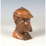 A mid-Victorian carved boxwood novelty inkwell, finely modelled as the head of a gentleman wearing a