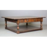 A modern Jacobean style solid oak coffee table, fitted with a single drawer, height 50cm, width