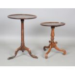 A George III mahogany and oak tripod wine table, height 72cm, diameter 51cm, together with a Regency