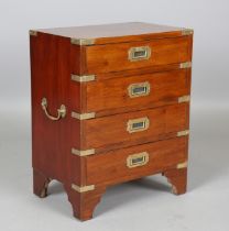A late 20th century yew and brass bound campaign style bedside chest of four drawers, height 59cm,