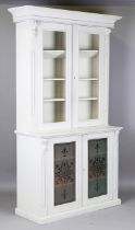 A late 19th century grey painted bookcase cabinet with carved foliate mouldings and frosted glass