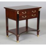 A late 20th century Empire style mahogany side table, fitted with two drawers and applied with